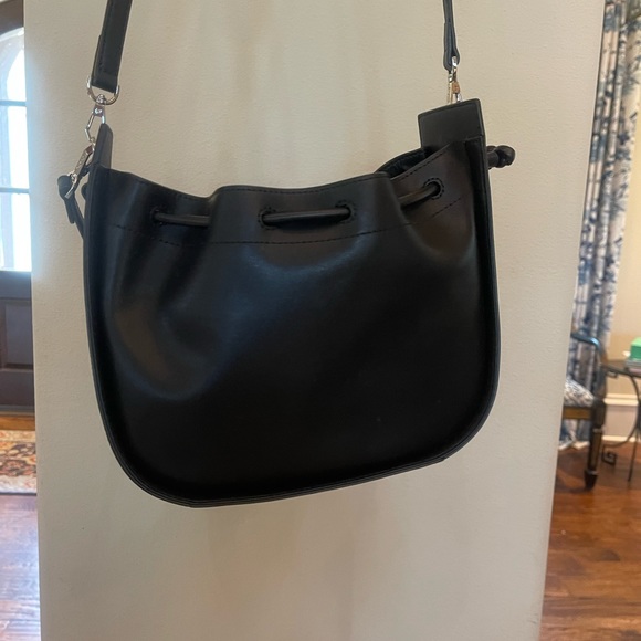 Black leather drawstring Oryany drawstring bucket bag. - Picture 3 of 15